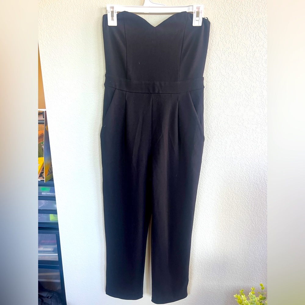 Black sleeveless pants suit